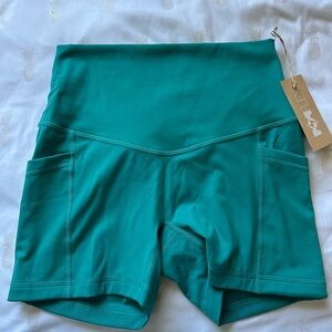 Popflex superscult booty shorts, size small, turquoise color